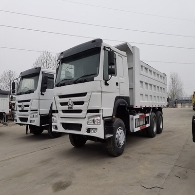 Послепродажное обслуживание 3 года 8х4 12 шины 50 тонн использованный Sinotruk HOWO грузовик с наклоном для добычи полезных ископаемых